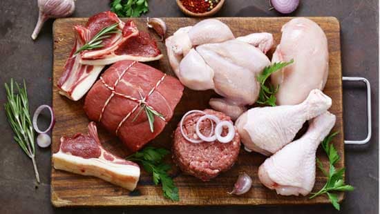 Meat and Poultry on a cutting board